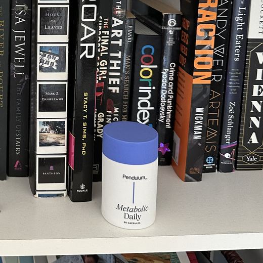 Pendulum Metabolic Daily bottle on the bookshelf in Joanna’s office